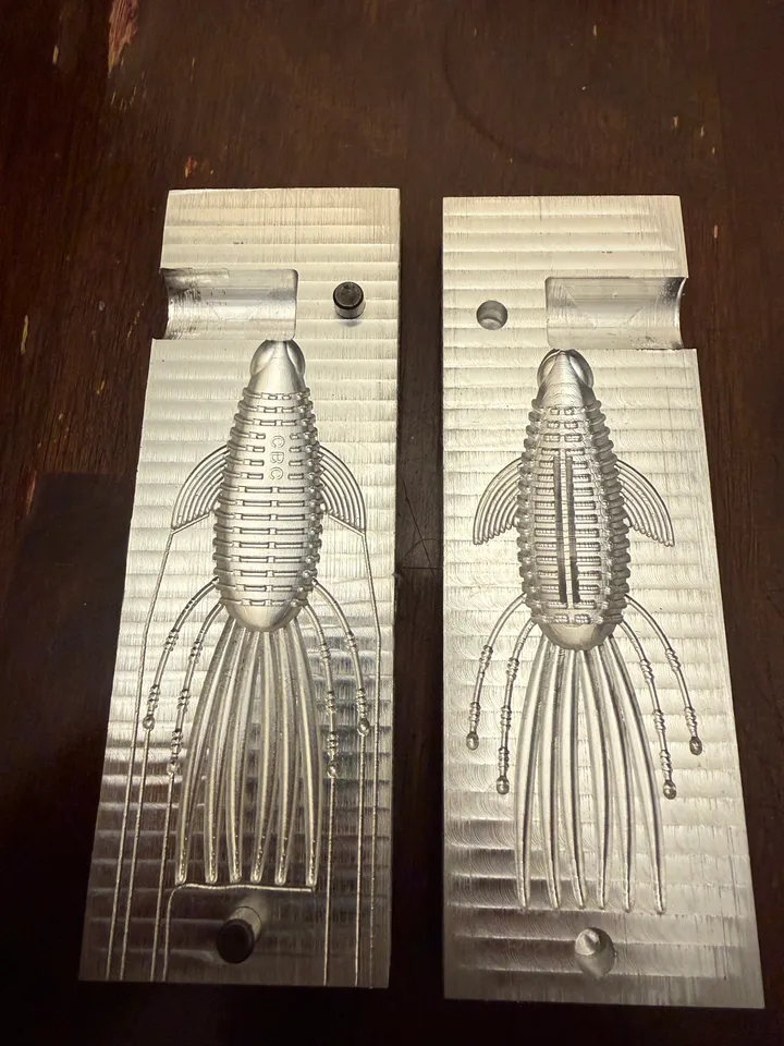 Open aluminum prototype mold with the Pad Bug body and appendage cavities